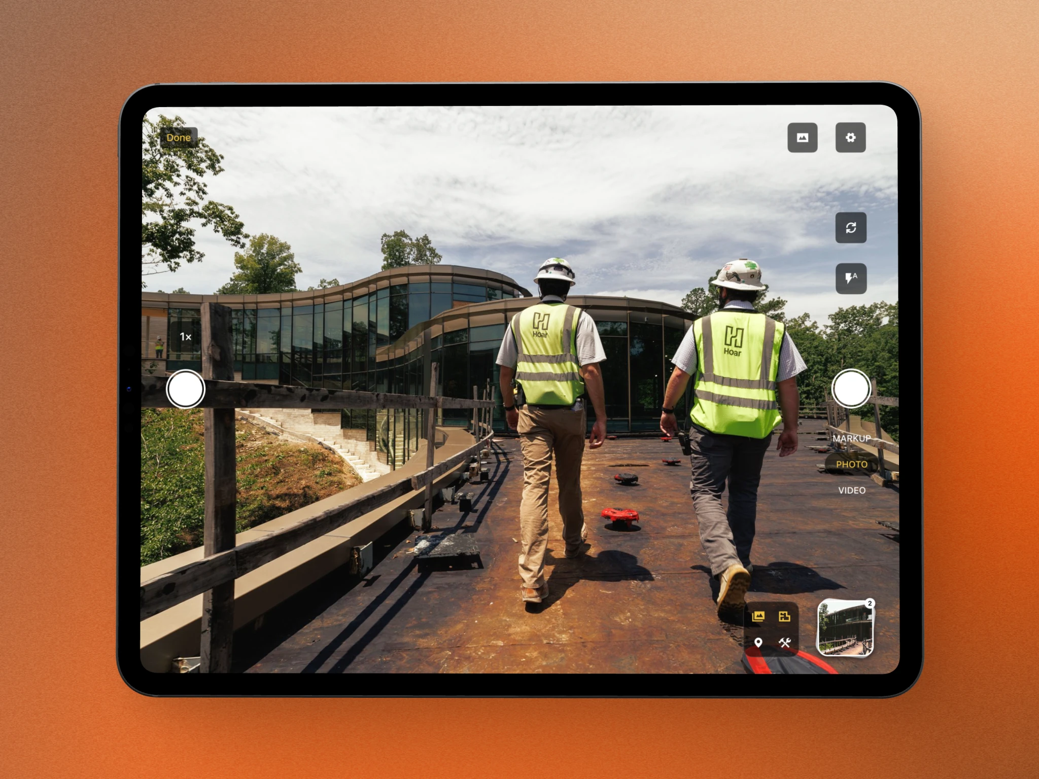 Procore camera redesign shown on an iPad at a construction site